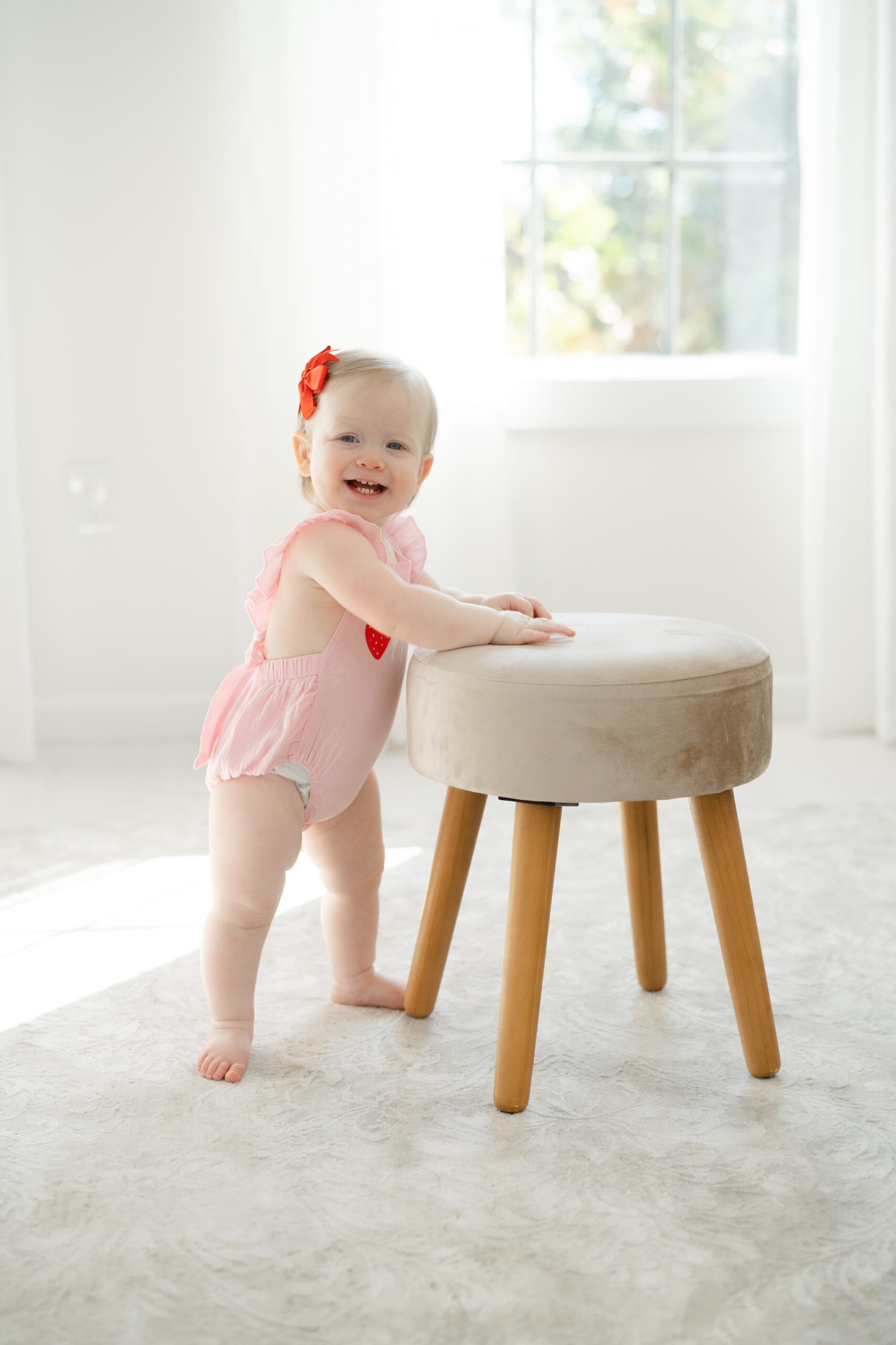 baby-girl-looking-into-camera-during-a-session-in-franklin-tennessee-with-nashville-family-photographer-dolly-delong