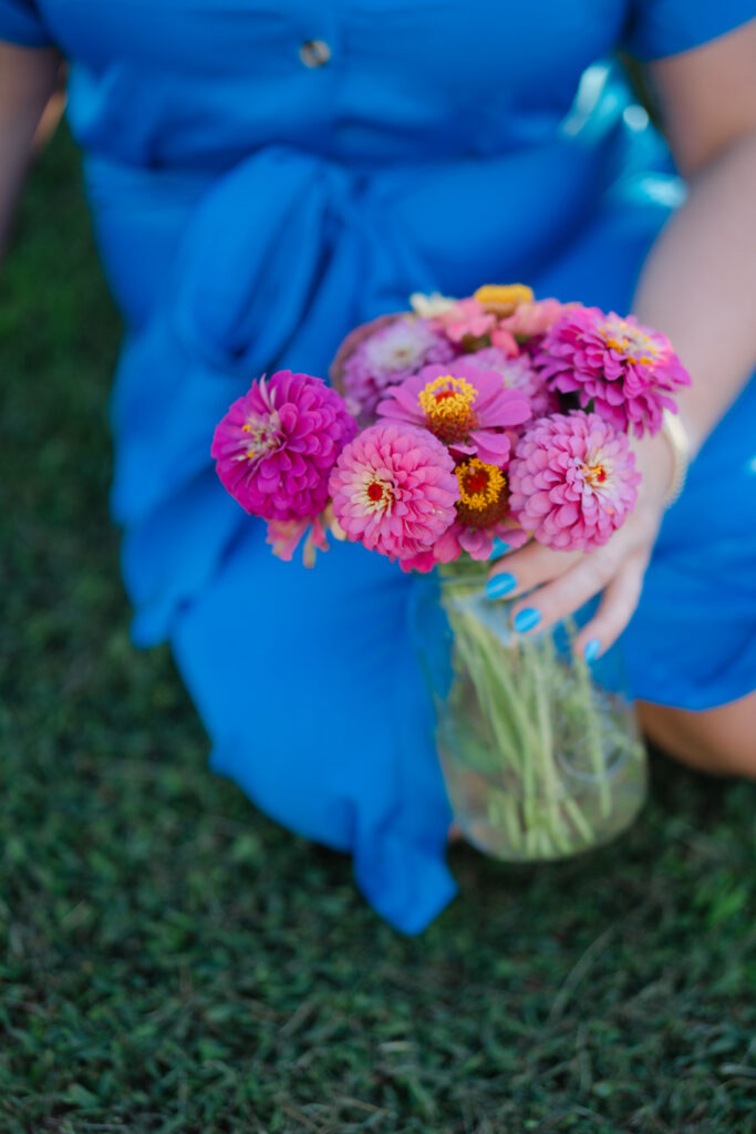 Close-up of a bright pink summer flower bouquet held during Nashville summer mini sessions